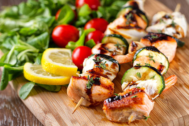 Fish skewers with salad