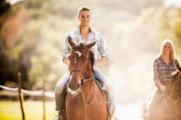 istock Couple horseback riding. 471651057