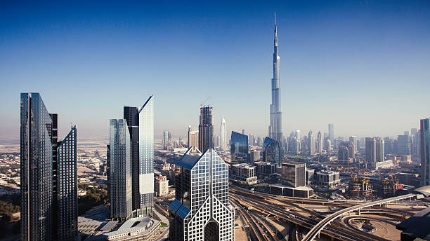 istock Dbuai sky line with traffic junction and Burj Khalifa 471651642