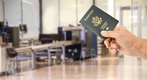 istock United States passport offered at airport security 471651996