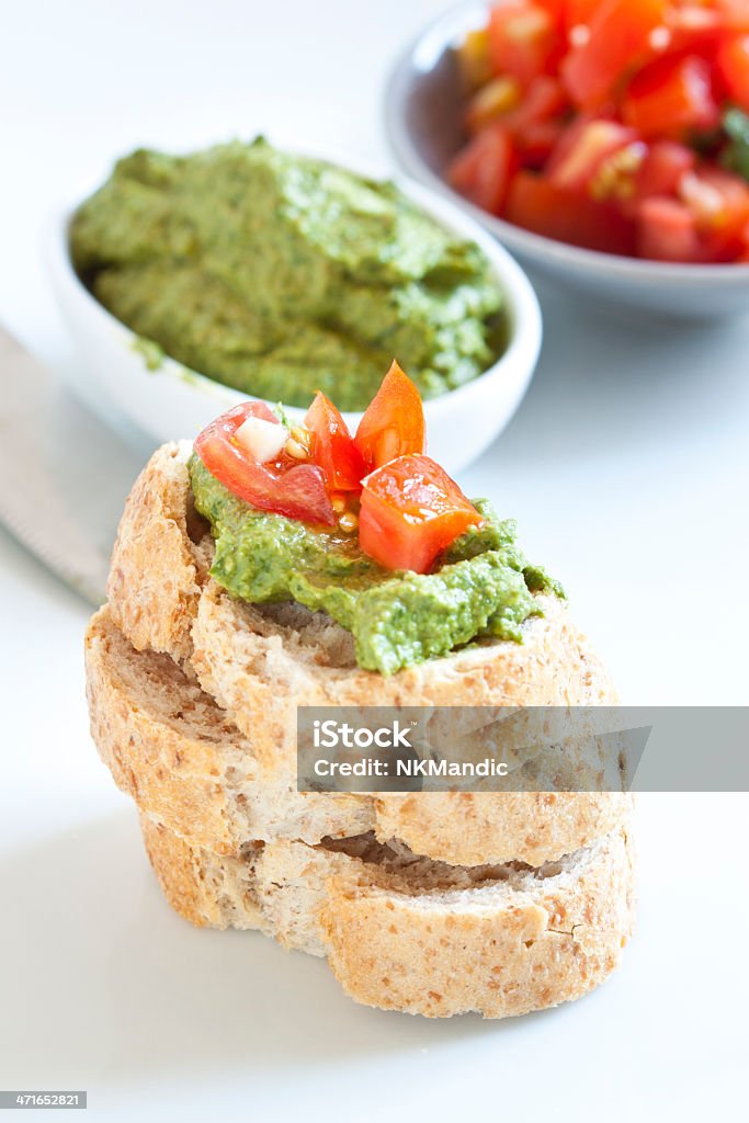 Panna Crostini con rucola e pomodoro - Foto stock royalty-free di Alimentazione sana