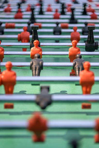 istock Soccer table game with red and black players. 471653230