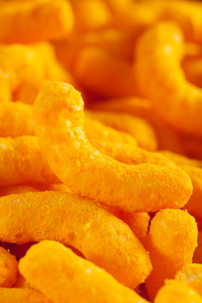 istock Unhealthy Orange Puffy Cheese Crisps 471653377