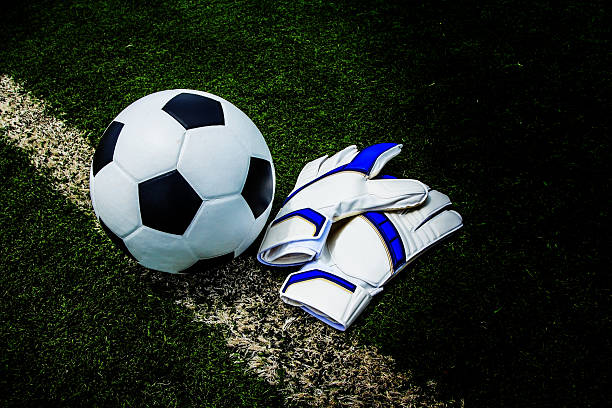 istock Soccer ball and gloves 471654177
