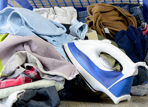istock smoothing-iron and clothes crumpled 471655002
