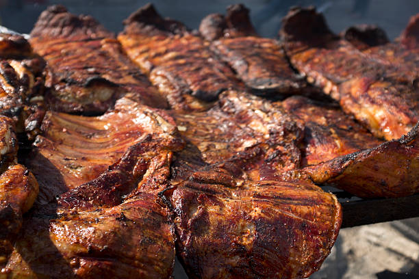 istock Pork Ribs Being Grilled Outdoors. 471655729