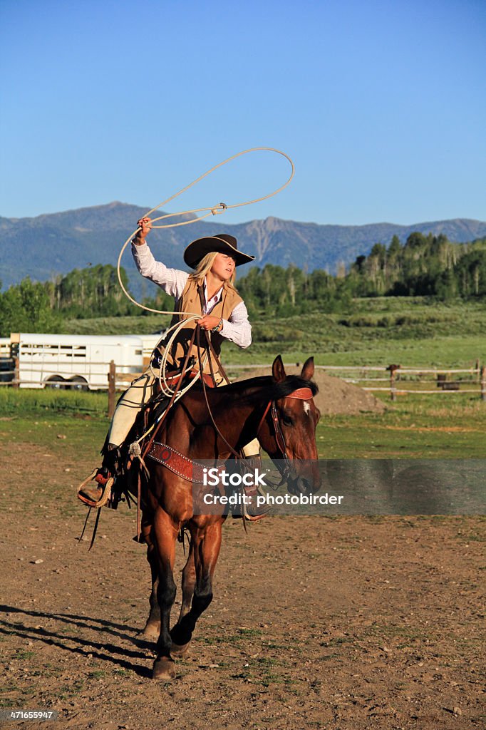 Cowgirl Throwing Lasso Stock Photo - Download Image Now - Cowgirl, Lasso,  Chaps - iStock