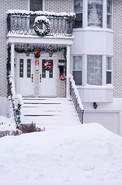 istock Entrance Christmas decorations filled with snow 471656007