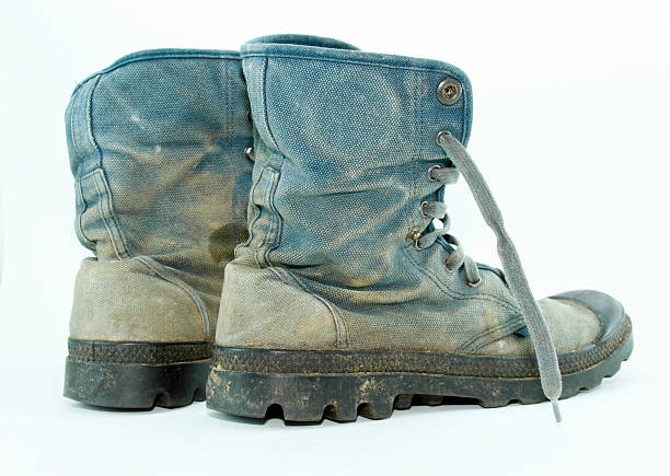 istock canvas shoes mud dirty 471656711