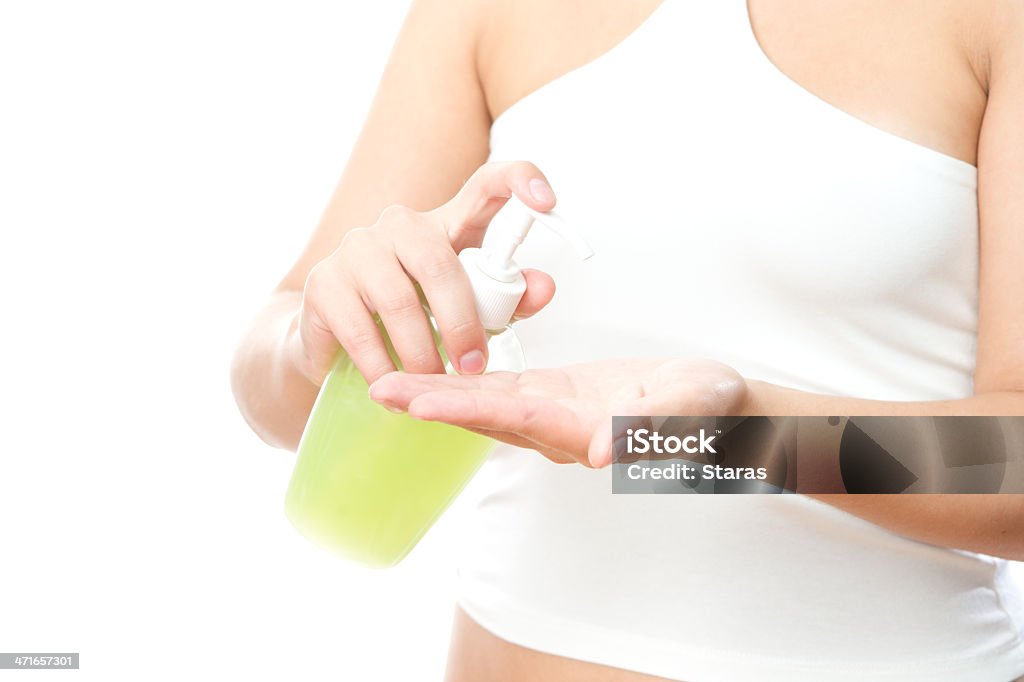 Femininas mãos com sabão líquido - Foto de stock de Adolescente royalty-free