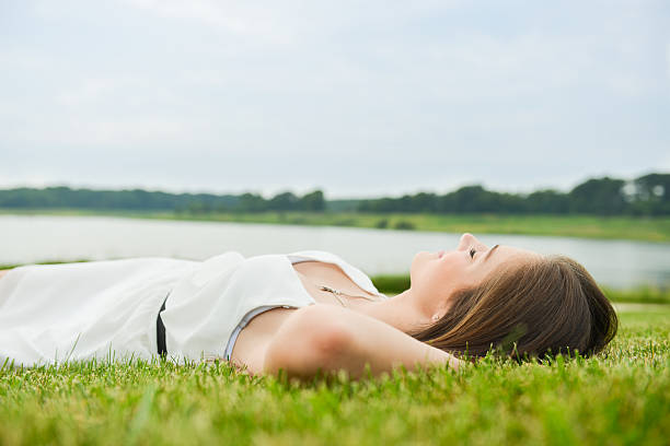 istock Woman Relaxing Under the Sky 471658683
