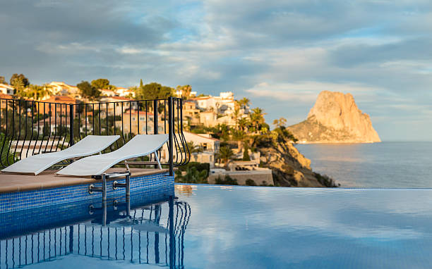 Luxury Villa's infinity pool in Spain. stock photo