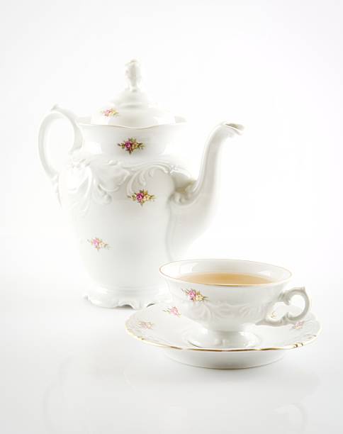 istock Old-style retro jug with tea on white background 471659780