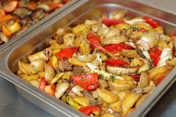 Steel container with baked potato wedges