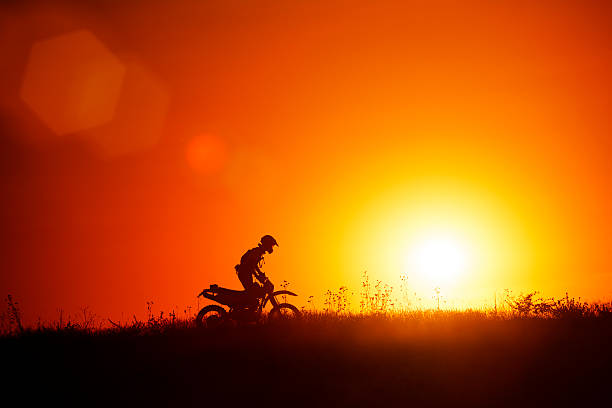 istock Silhouette of motocross rider 471660277