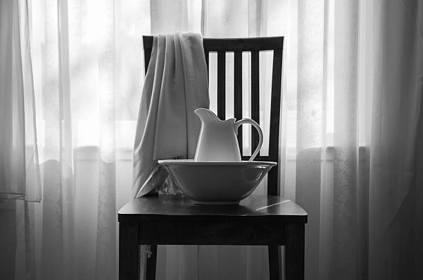Black and white image of bowl with pitcher