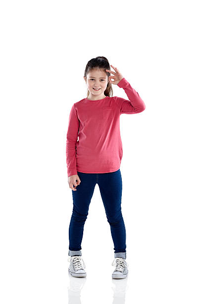 istock Cute little girl gesturing ok sign 471660758