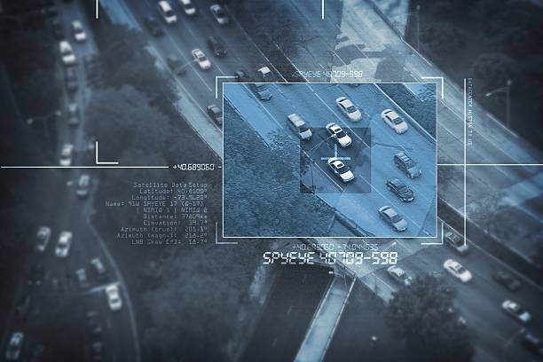 Spy Satellite Spy Satellite Digital Bird Eye View - Search For Suspicious Car in Afternoon Commute. Digital Spy Targeting Theme. Surveillance Systems. traffic photos stock pictures, royalty-free photos & images