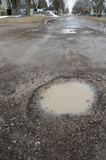 istock Weather Damaged Roadway 471660950