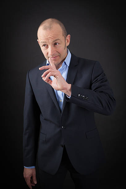 istock handsome man doing different expressions in different sets of clothes 471661026