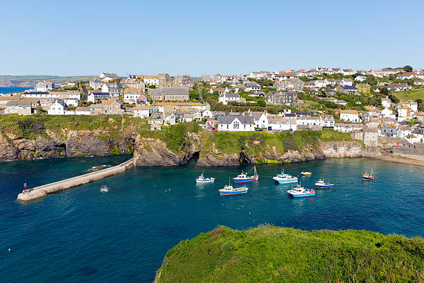 istock Cornwall harbour boats blue sea and sky 471661557