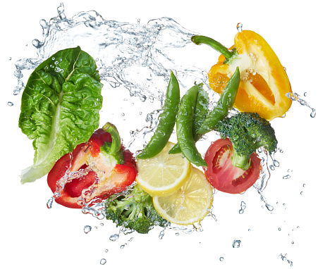 various type of vegetables and fruits with water splash