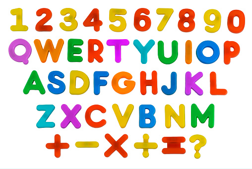 A Child's magnetic plastic ABC Letters laid out in QWERTY presentation.