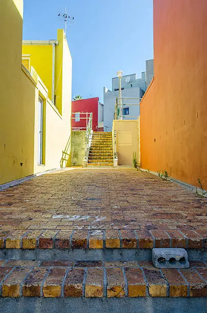 The Colourful Bo Kaap situated in Cape Town in the Western-Cape is a great Tourist Spot. A Colourful alley joining streets on two levels.