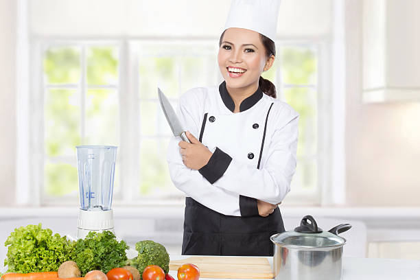 istock female chef Cooking in the kitchen 471665032