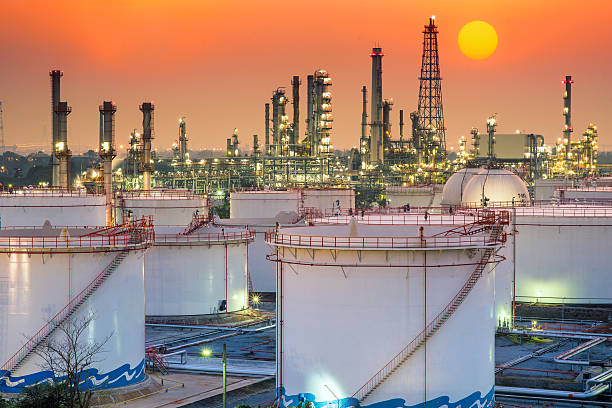 istock Oil and gas industry at sunset 471665256