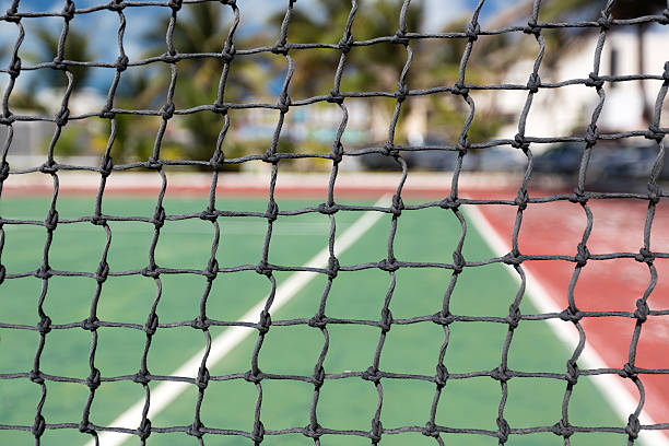 istock Tennis net, outdoor at empty court 471665504