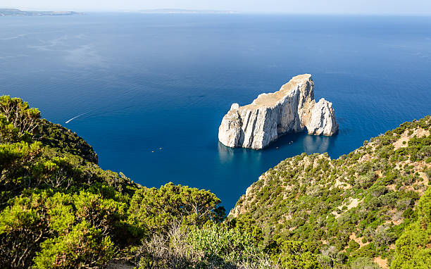 Sardinia, Sulcis coast panorama of famous cliff called Pan di Zucchero, in the coast near Iglesias city, Sardinia Buggerru stock pictures, royalty-free photos & images