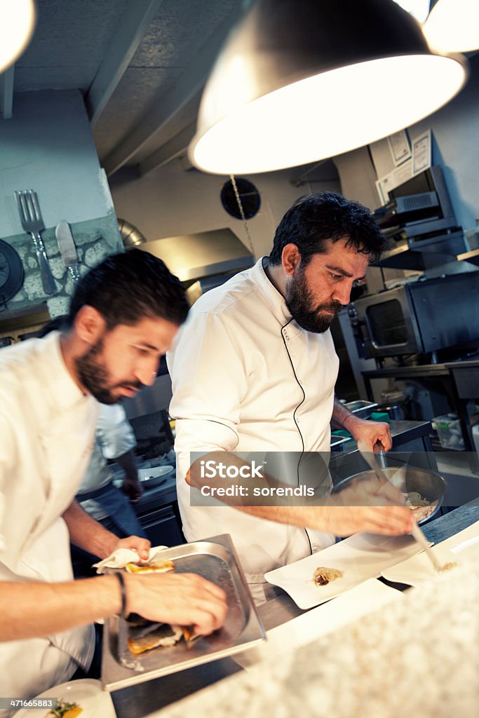 Chefs at work Accuracy Stock Photo