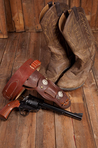 istock Revolver and Cowboy Boots 471666236