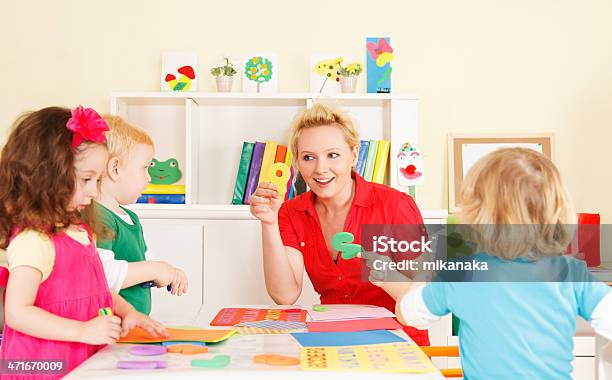 Preschoolers With Teacher Stock Photo - Download Image Now - Adult, Art And Craft, Assistance