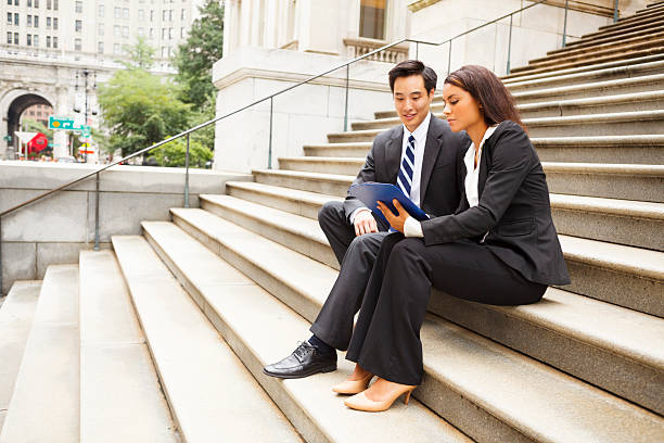 istock Professionals Working Together Outdoors 471670359