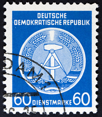 DDR - CIRCA 1952: A Stamp printed in GDR (German Democratic Republic - East Germany) shows DDR national coat of arms with inscription \