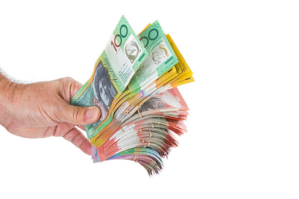 istock Fist full of money. 471671904
