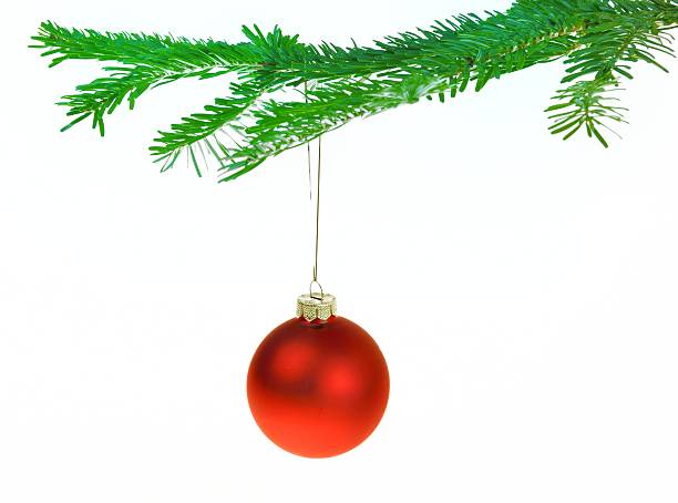 istock Red Christmas decorations on a branch 471671991