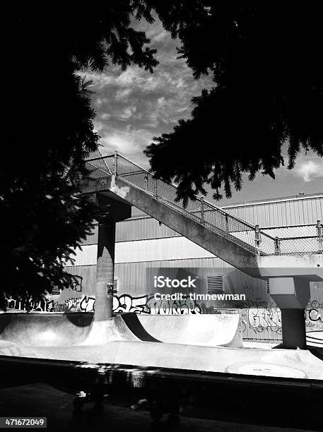 Skate Park With Graffiti And Foot Bridge Stock Photo - Download Image Now - Graffiti, Skateboard Park, Sports Ramp