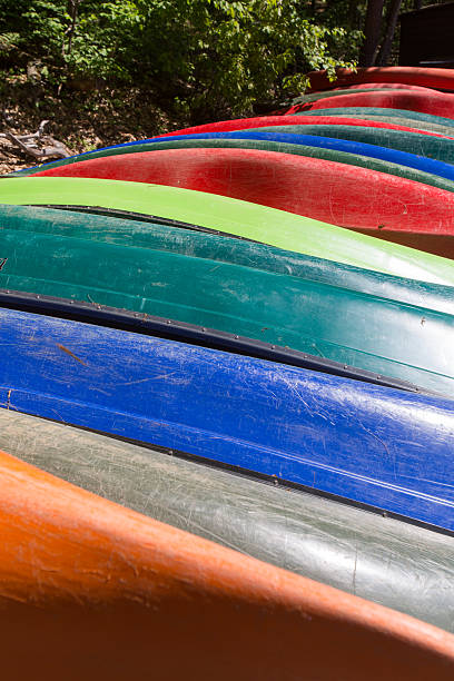 istock line of canoes 471672387