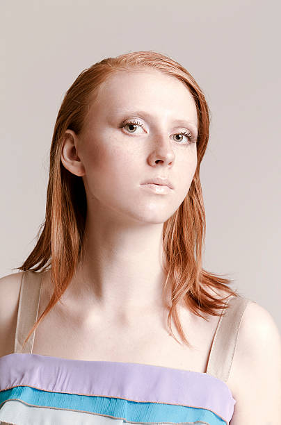 istock Beautiful woman with red hair 471674013