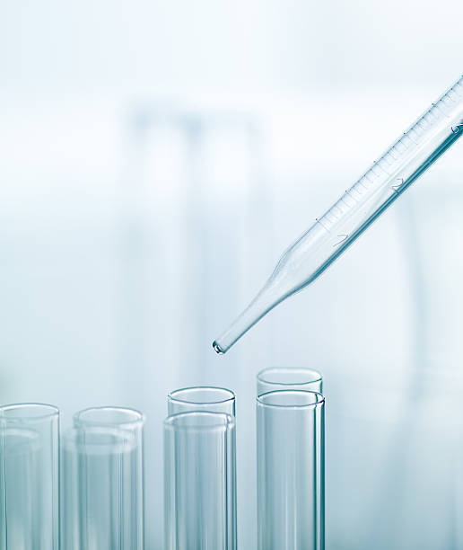 istock Pipette with a group of medical tubes 471674079
