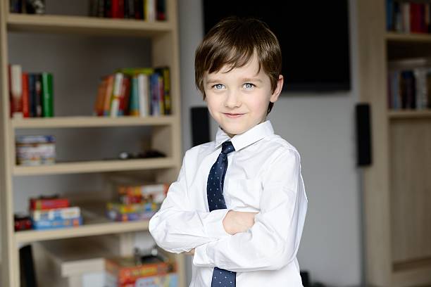 istock Elegantly dressed in a white shirt and tie little boy 471674576