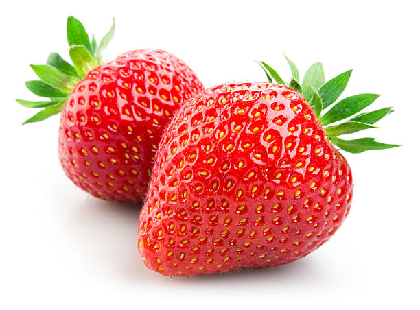 two strawberries isolated on white background - strawberry stockfoto's en -beelden