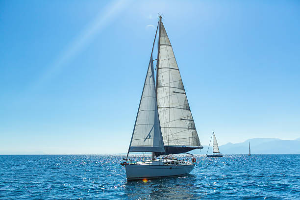 istock Ship yachts with white sails in the open Sea. Sailing. 471675028