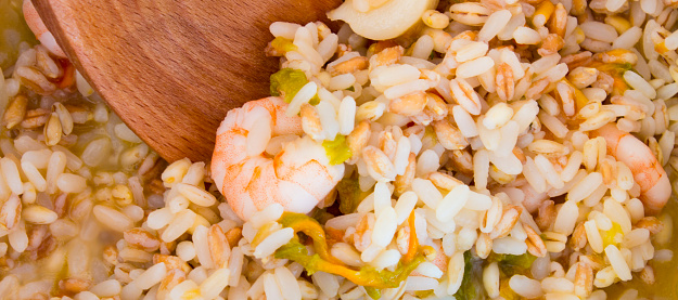 a good plate of rice with shrimp and natural ingredients