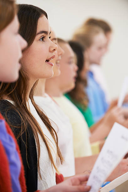 istock Large Group Of Children Enjoying Drama Workshop Together 471677182