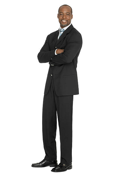 Confident Businessman Arms Crossed On White Background stock photo