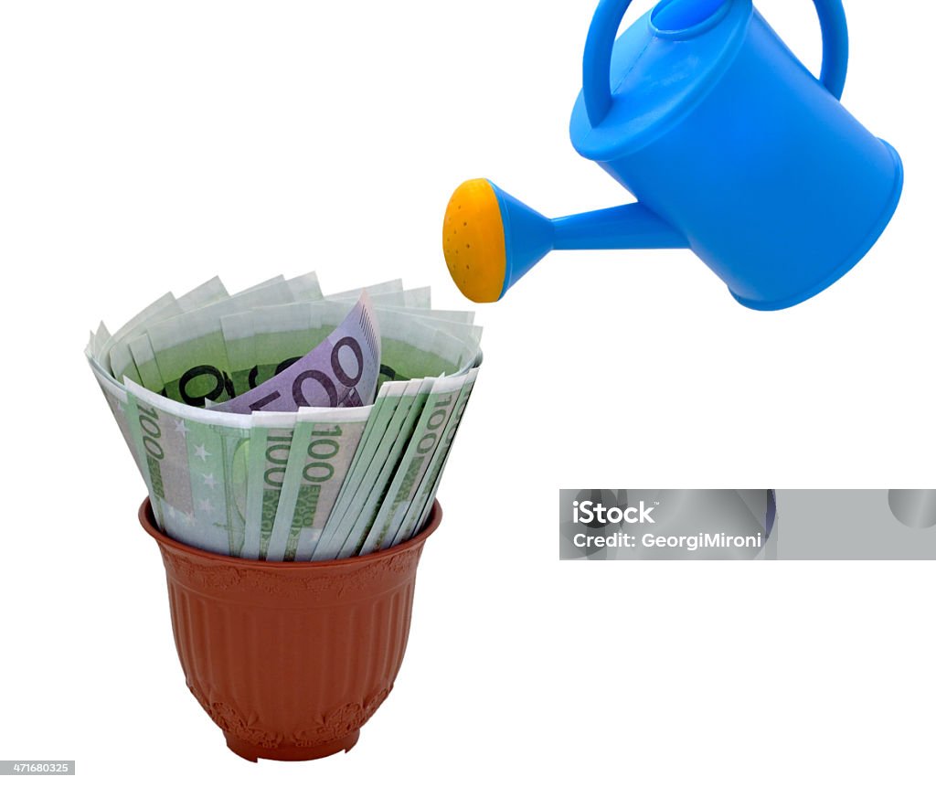 Gießen und Geld in einen Blumentopf - Lizenzfrei Bewässern Stock-Foto